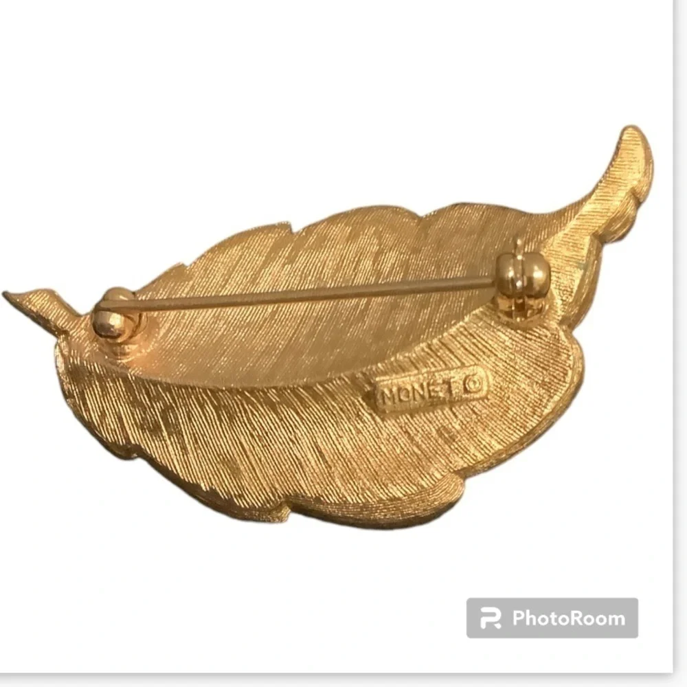 - Monet gold tone enamel leaf brooch